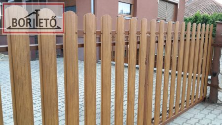 Íves kerítés léc  két oldalon famintás világos dió felület 11,5 cm széles  4 db rögzítőcsavarral ingyenes szállítással!